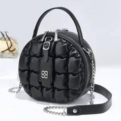 black color round sling bag