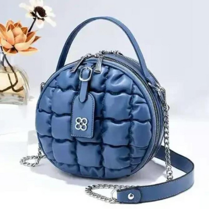 blue color round sling bag