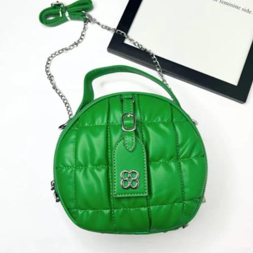 green color round sling bag 
imported bag
