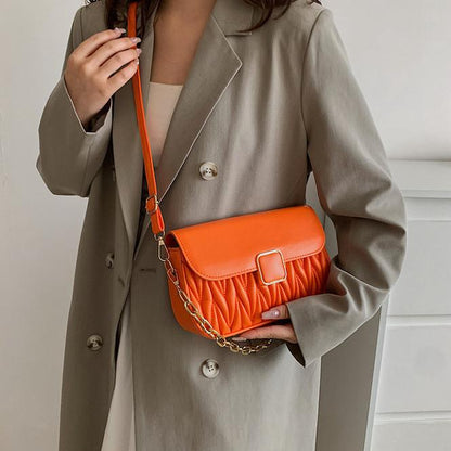 orange color crossbody bag
sling bag orange color 
flap closure bag