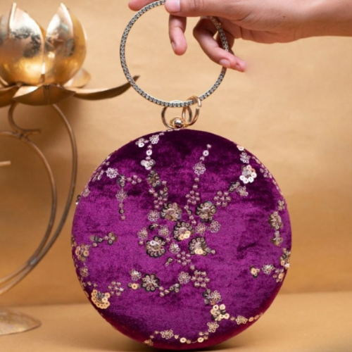 round shape clutch
purple color
