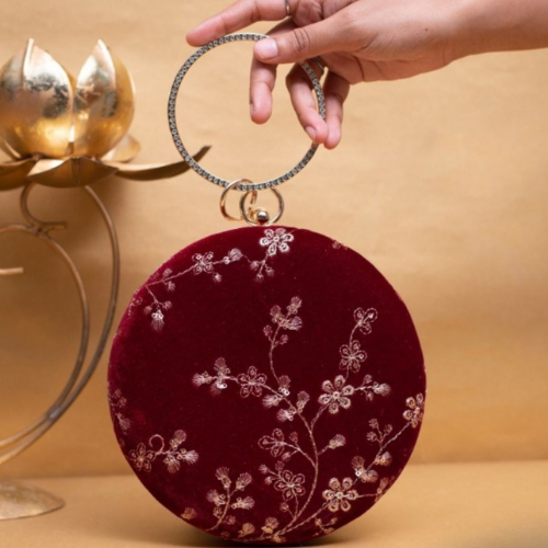 red color ethnic clutch