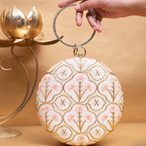 white color round clutch