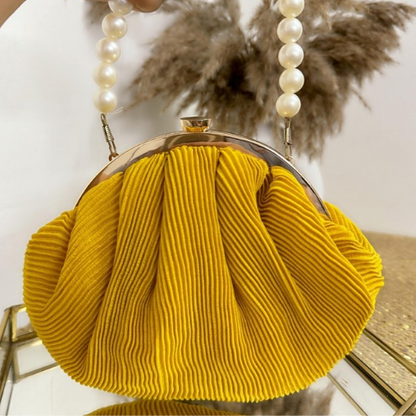 yellow color potli batua bag